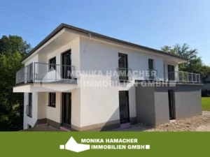 Neubau im Milchborntalweg! 3-Zimmerwohnung im Souterrain mit Terrasse und Garten